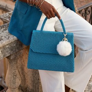 the azure flap bag with pom