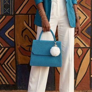 the azure flap bag with pom